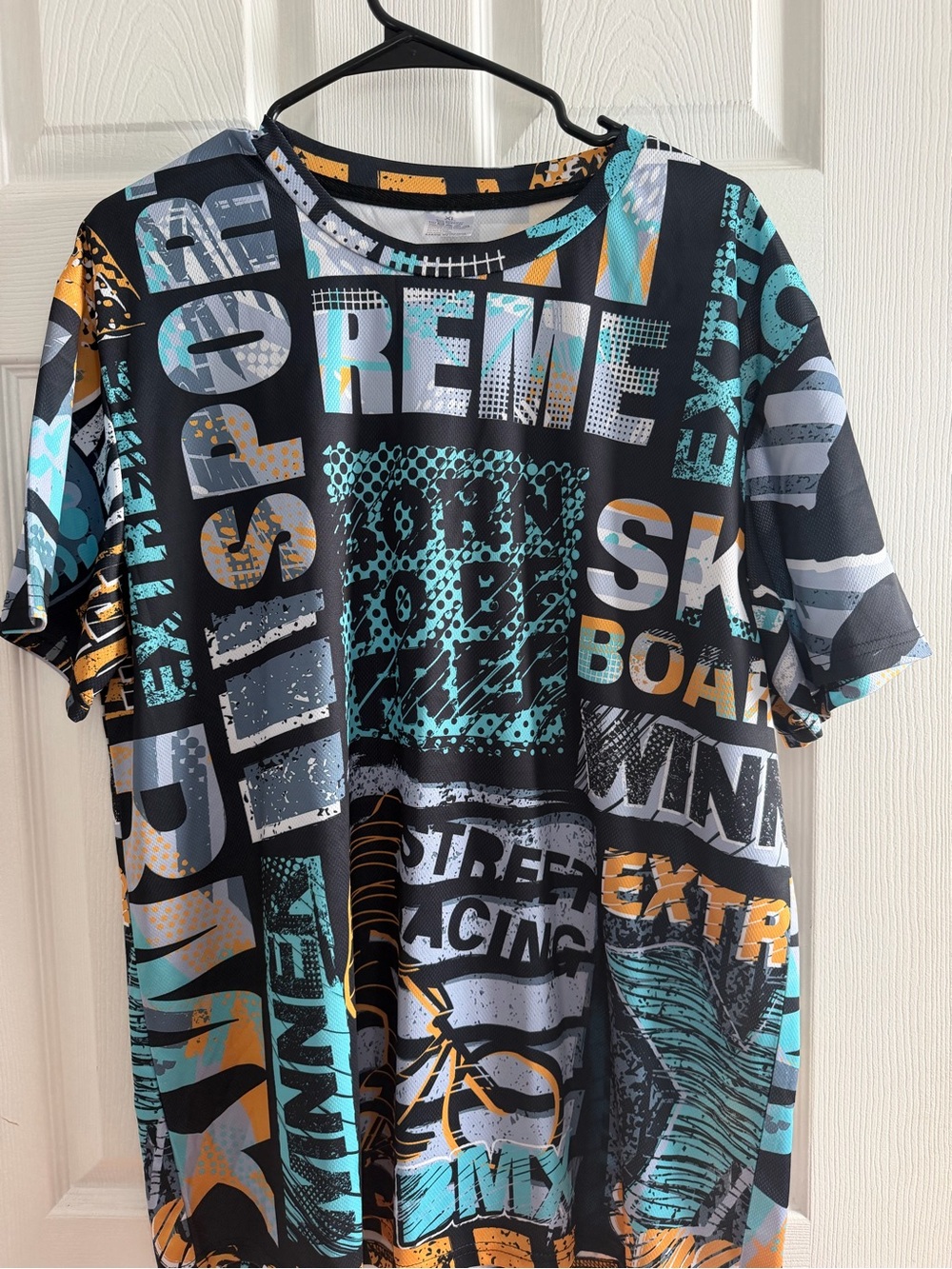 Graphic Crew Neck Men's Shirt in Black with Teal & Orange Accents